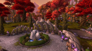 A quiet garden square with red autumn trees